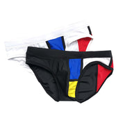 Stitching fashion triangle swim trunks