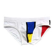 Stitching fashion triangle swim trunks